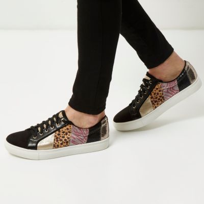 Black patchwork trainers